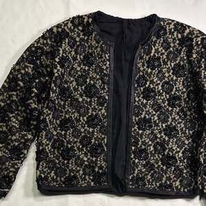 Vintage 1960’s Floral Lace Jacket, NO Tags.
Size Small